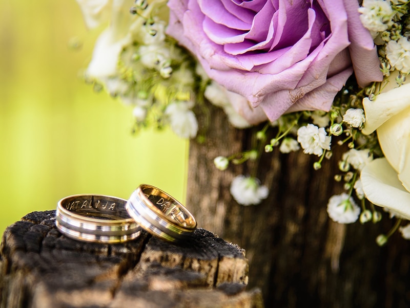 Two wedding rings beside each other