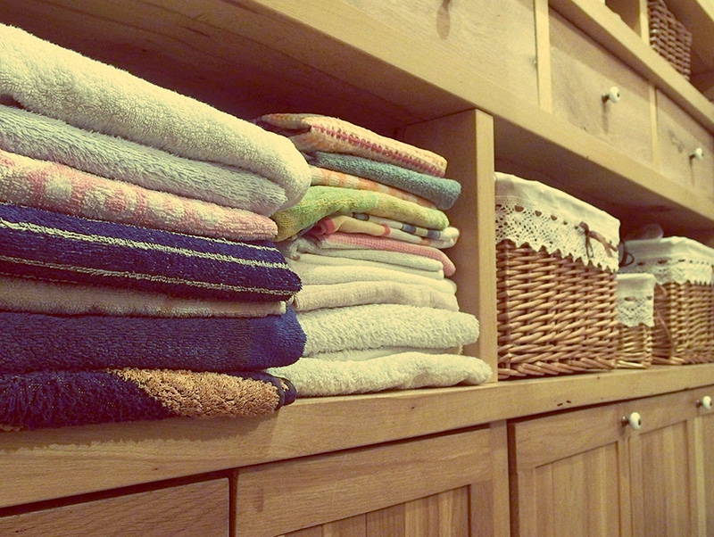 Towels on a Shelf After a Family Change